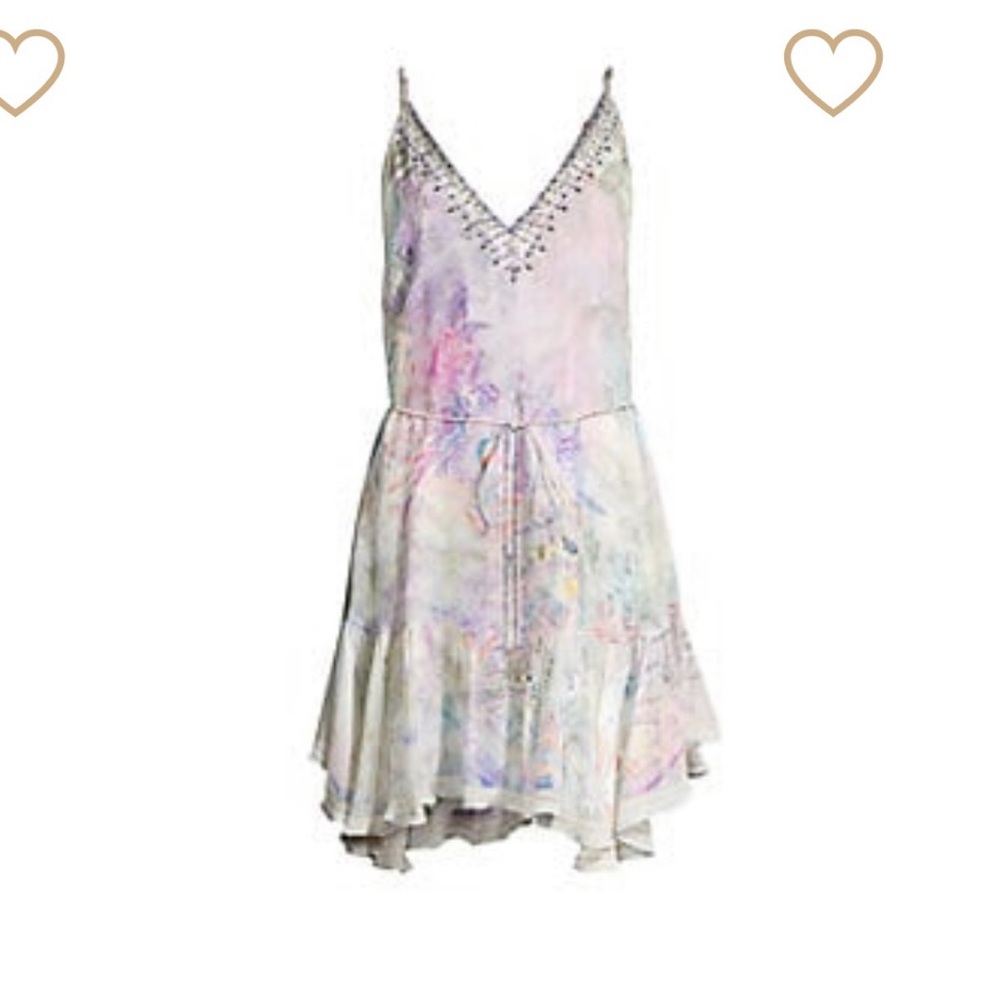 Camilla dress, has tie .. pockets..super light and feminine
